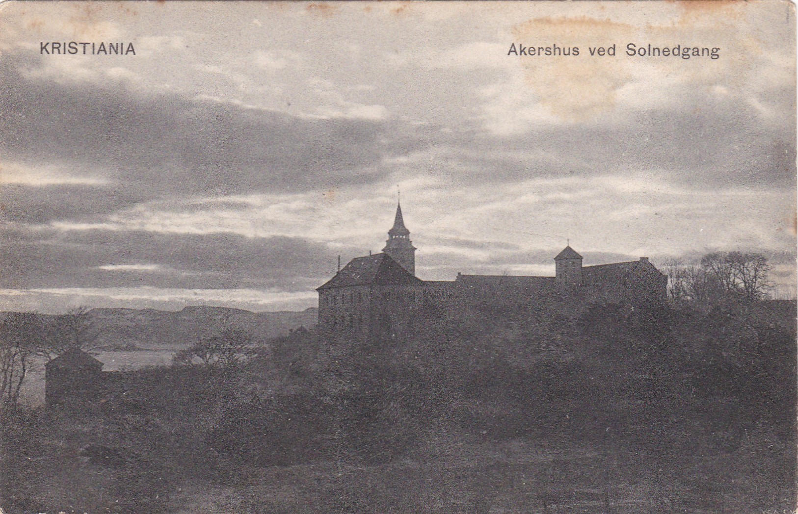 Kristiania. Akershus ved Solnedgang ( Alstrup 284)