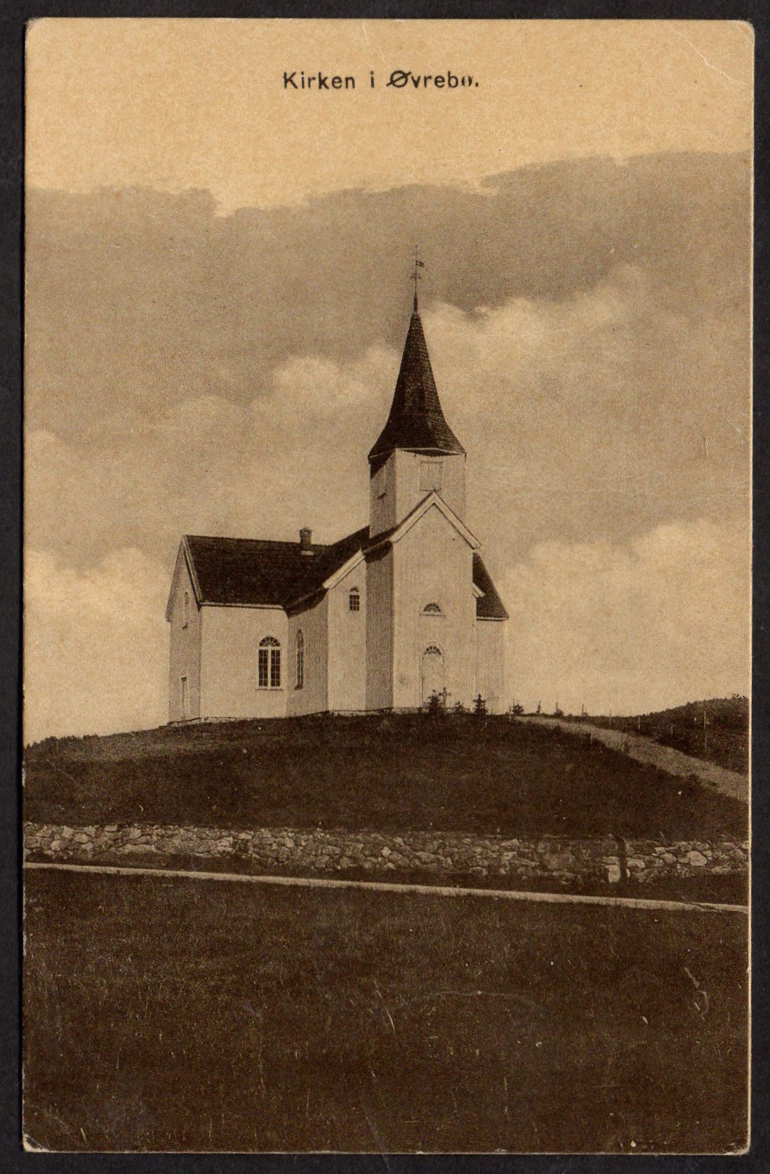 Kort Kirken i Øvrebø st 1928- Eneret Øvrebø Meieri og Handelssamlag