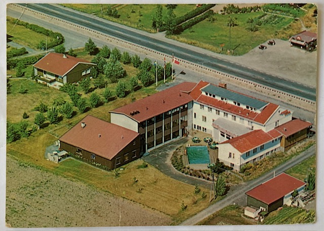 RYGGE Hotell med reklame på baksiden
