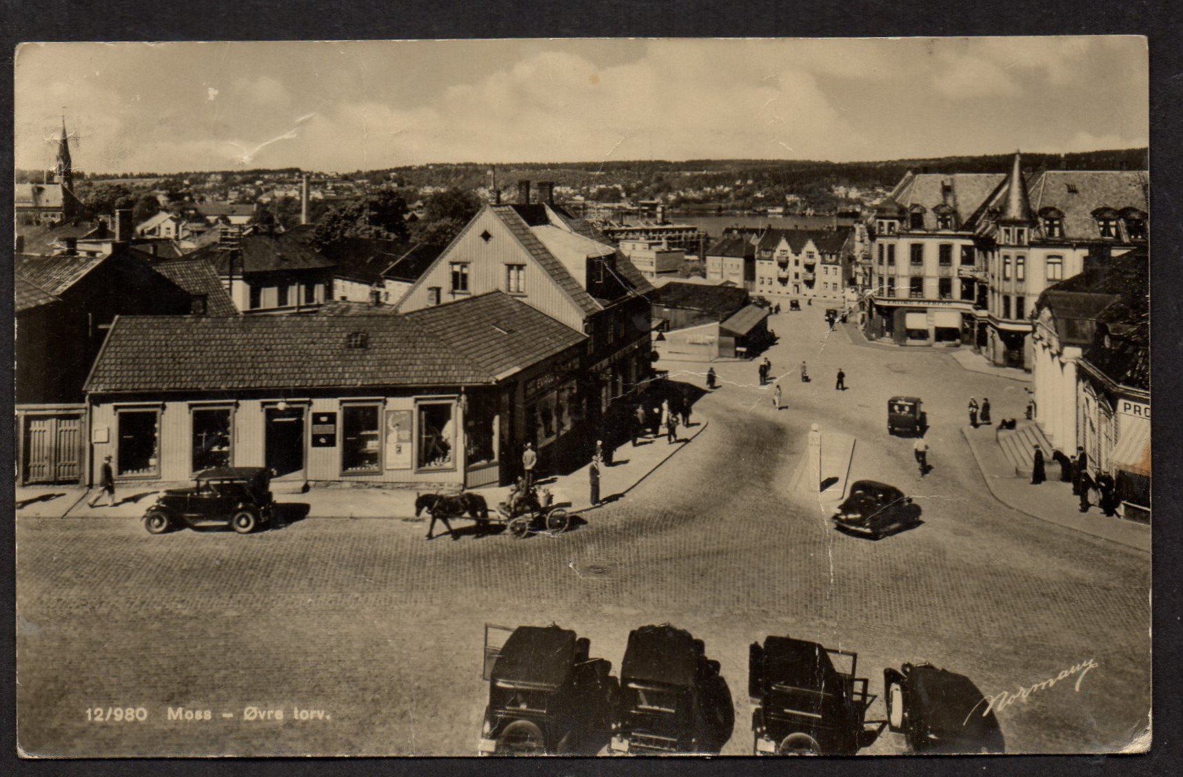 Kort Moss-Øvre torv st Moss 1942 - Normanns folag- Ikke så pen forside